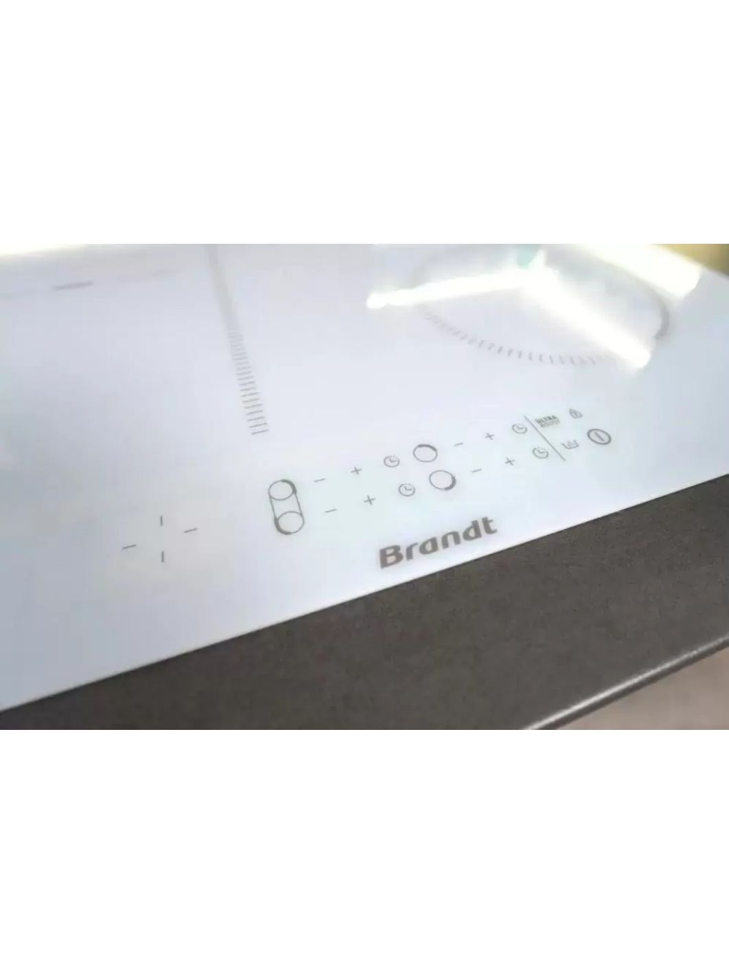 Варочная панель индукционная Brandt BPI164DUW